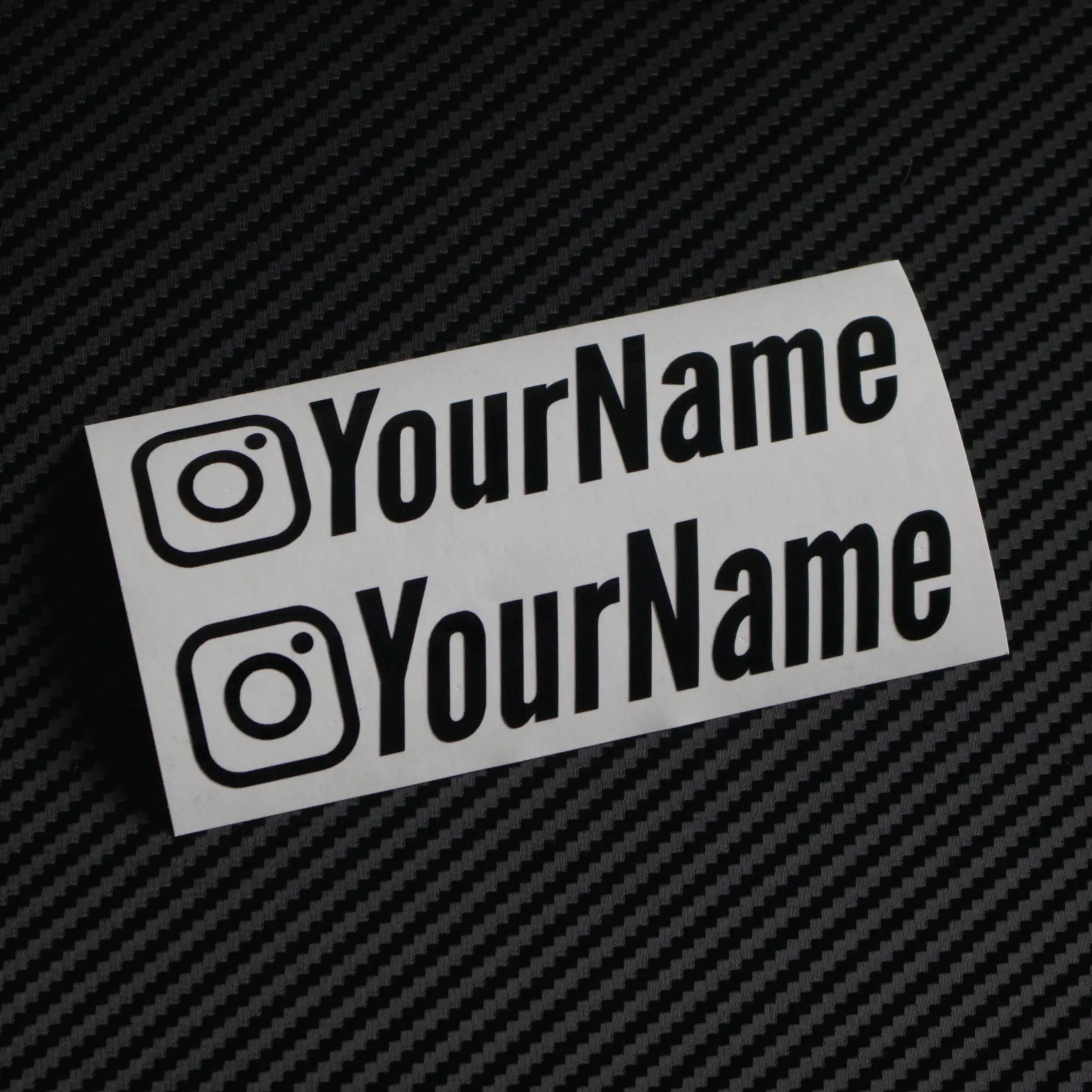 Gloss Instagram car sticker decal on carbon fibre background